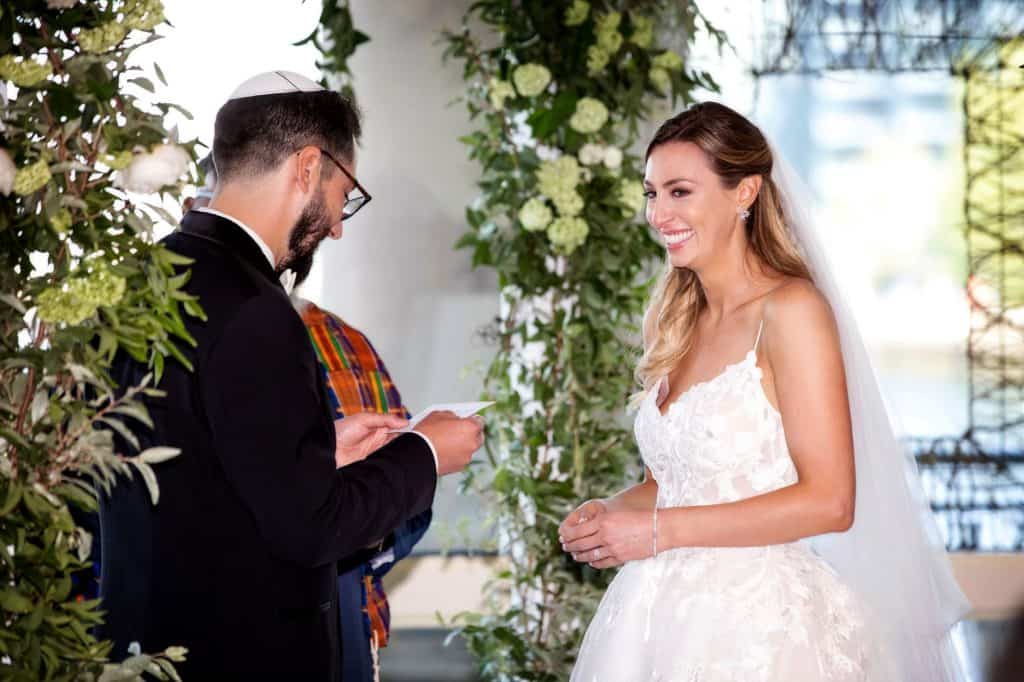 Bride Smiling During Exchange of Vows