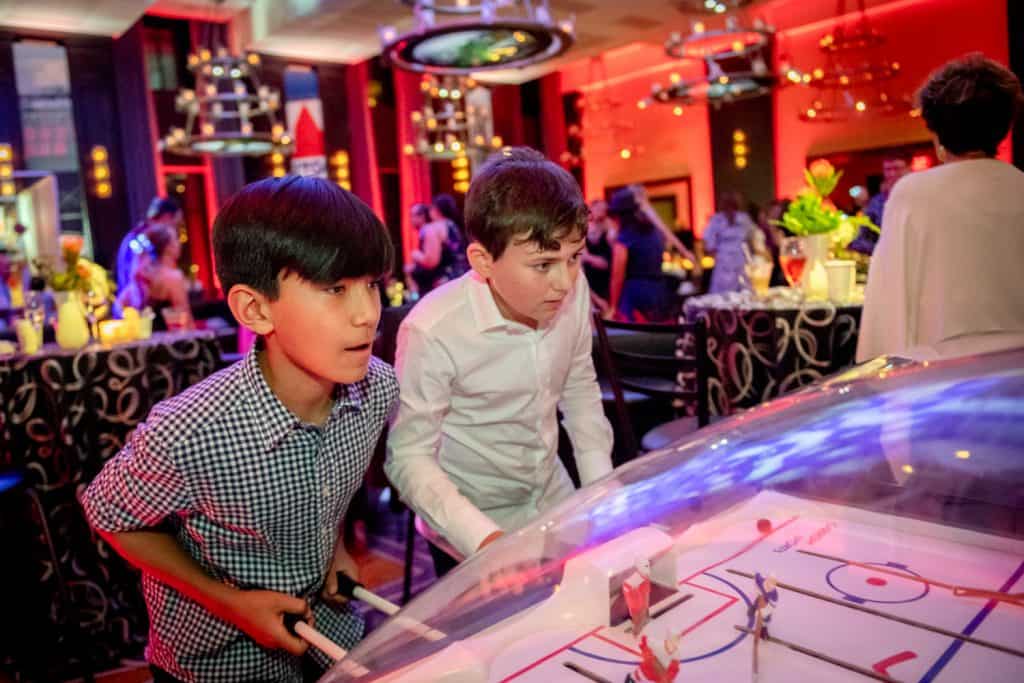 Bar Mitzvah Attendees Playing Fooseball