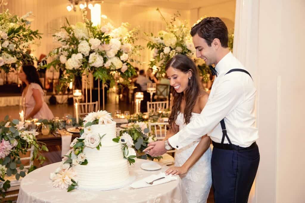 Jason and Jessica Cutting Wedding Cake